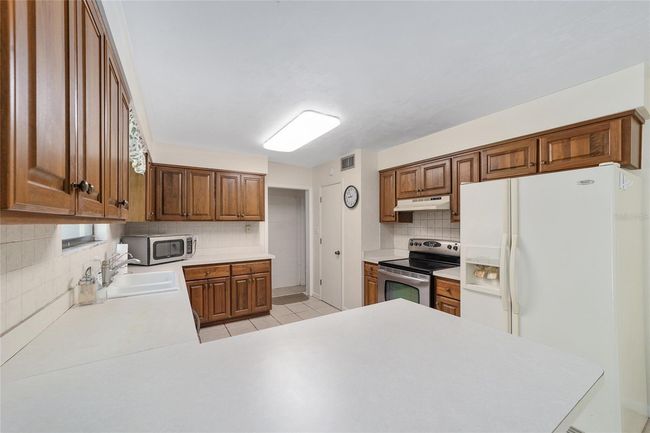 13207 Sw Williston Rd, House other with 3 bedrooms, 2 bathrooms and null parking in MICANOPY FL | Image 7