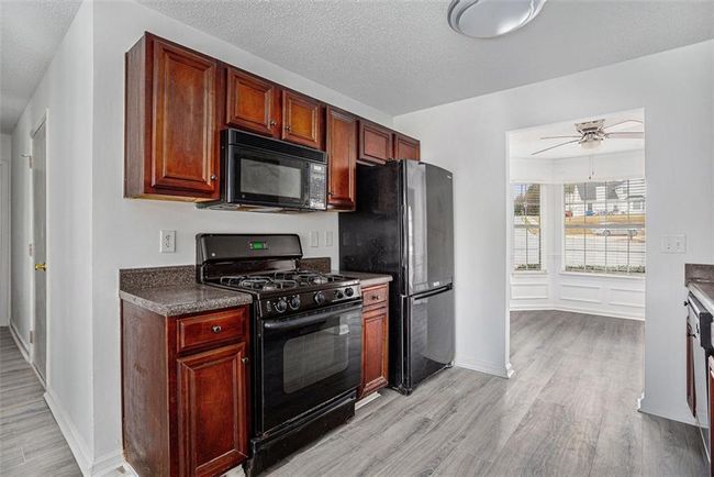 6876 Wildboar Dr, House other with 4 bedrooms, 3 bathrooms and 4 parking in Fairburn GA | Image 10