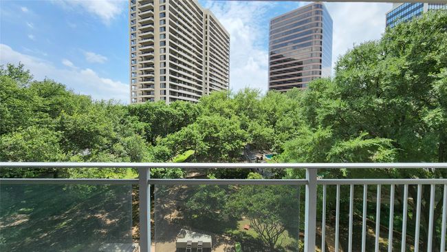 Sweeping view directly out the unit's balcony. | Image 13
