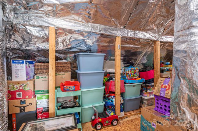 Tons of storage and radiant barrier in attic | Image 34