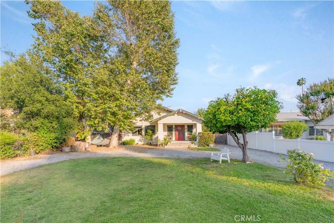 Privacy, shade, and charm—mature trees line this 12, 632 sq ft lot just north of the 91 Freeway. | Image 10