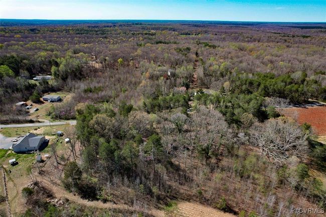 Birds eye view of property with a forest view | Image 19