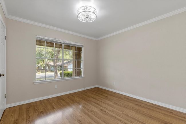 Comfortable and inviting, the guest bedrooms offer ample space and large closets, making them ideal for family, friends, or a home office | Image 18