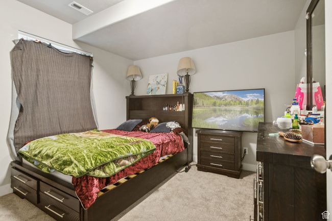 Bedroom with light carpet | Image 39