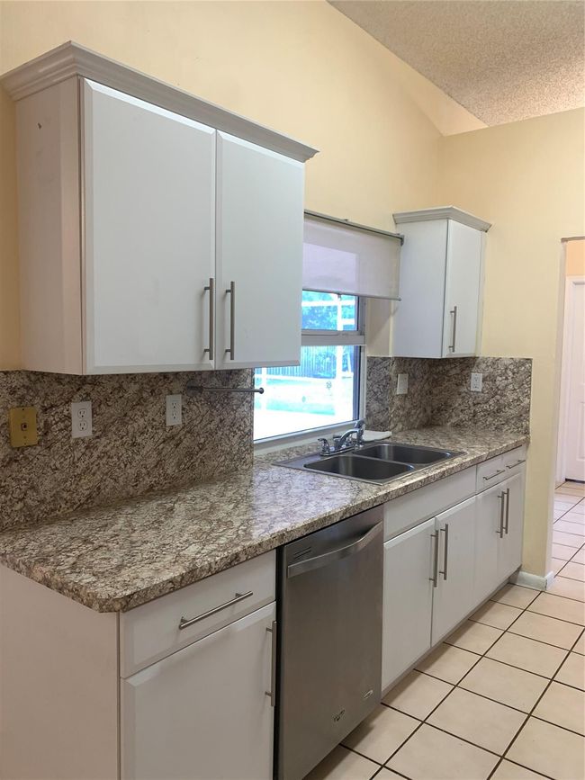 9840 Nw 28 Th Ct, House other with 4 bedrooms, 2 bathrooms and null parking in Coral Springs FL | Image 19