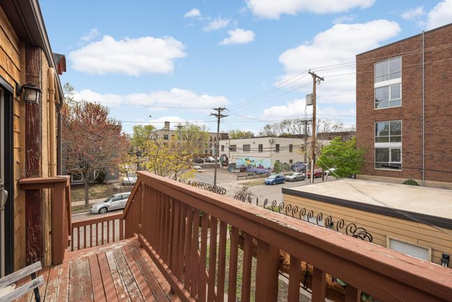 Conveniently head right now the back stairs to your private garage. | Image 14
