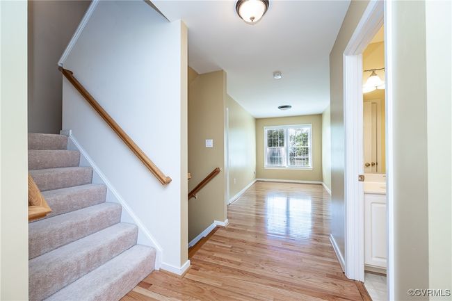 Corridor featuring light wood finished floors and baseboards | Image 29