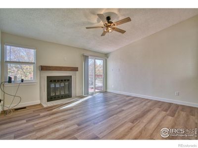 Brand new laminate plank flooring, paint, windows, patio door, blinds, light fixtures, craftsman style doors, trim and HVAC system. Truly turn-key! | Image 3