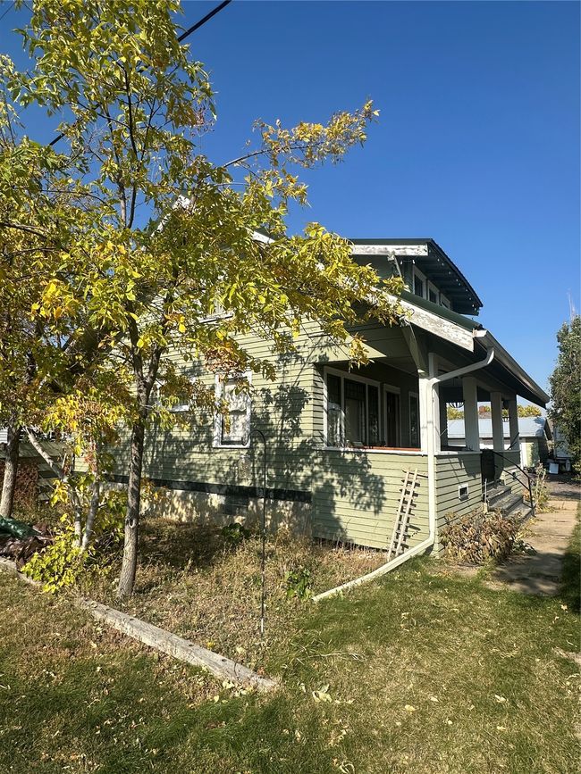 View of property exterior featuring a lawn | Image 22