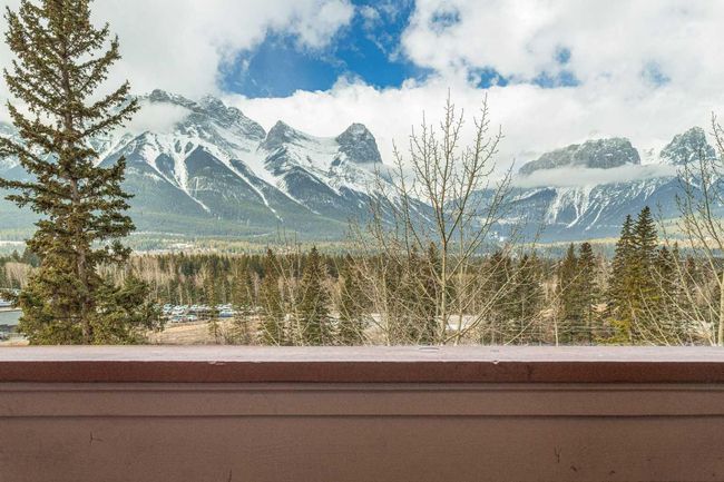 402 - 191 Kananaskis Way, Condo with 3 bedrooms, 3 bathrooms and 1 parking in Canmore AB | Image 4