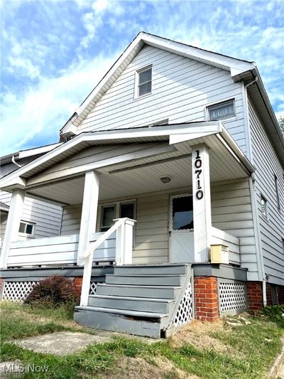 View of front of property featuring a porch | Image 1