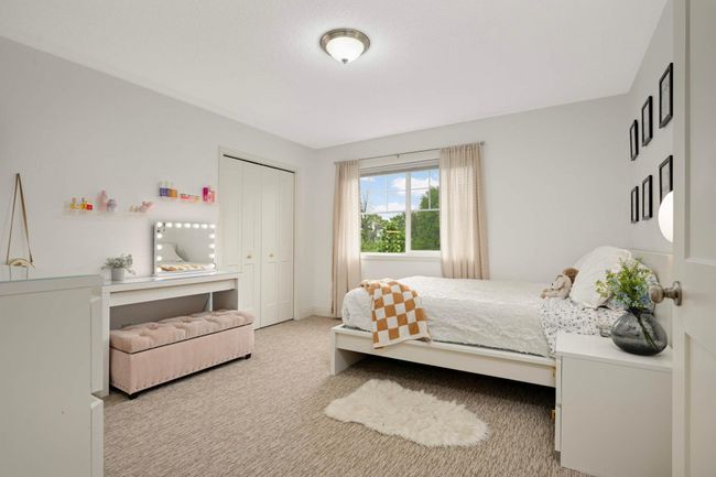 Second of four upper-level bedrooms. | Image 31