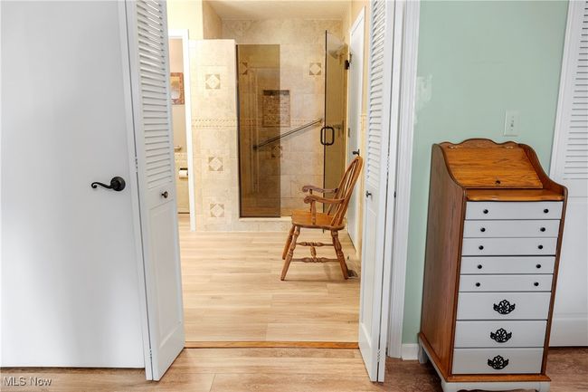 Hall featuring light wood finished floors | Image 21