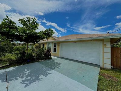 3056 Sw Ann Arbor Road, House other with 4 bedrooms, 2 bathrooms and null parking in Port St Lucie FL | Image 1