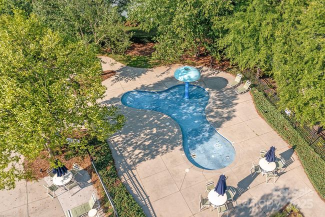 Kiddie pool area with a waterfall feature | Image 31