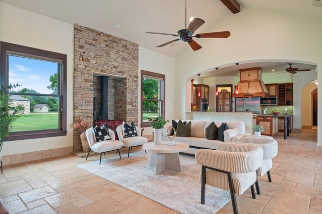 Living area open to gourmet kitchen. | Image 13