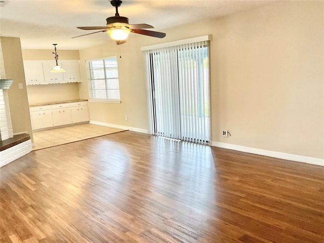 view from den into kitchen | Image 10