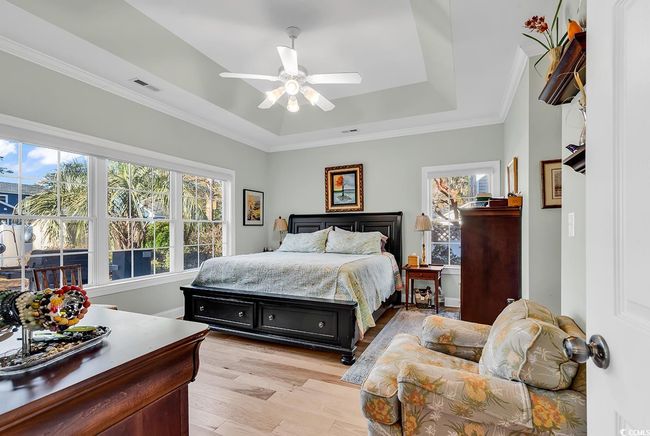 Living room with a wealth of natural light, ceiling fan, and light hardwood / wood-style flooring | Image 17