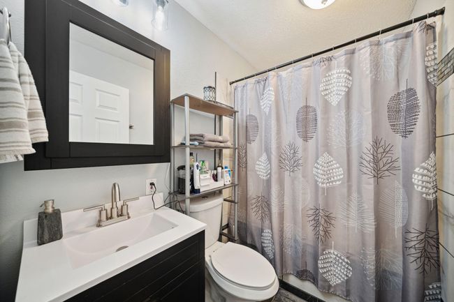 Recently renovated lower level bathroom with amazing shower. | Image 20