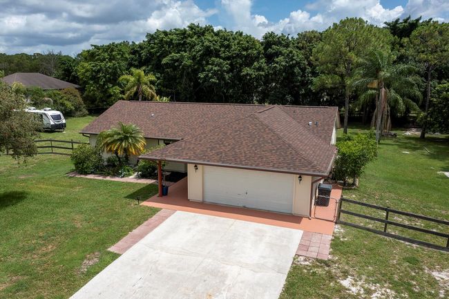 15429 Temple Blvd, House other with 3 bedrooms, 2 bathrooms and null parking in Loxahatchee FL | Image 59