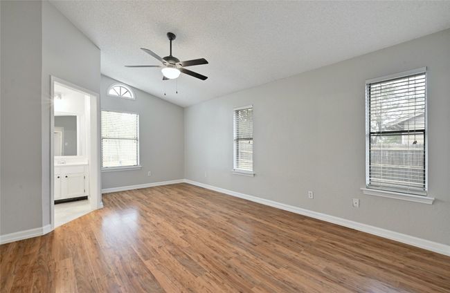 This is the primary suite which is situated in the back of the home and overlooks the backyard. | Image 15