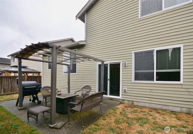 another view of the back yard fully fenced. | Image 33