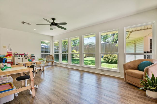 Amazing sunroom overlooking beautiful backyard | Image 11