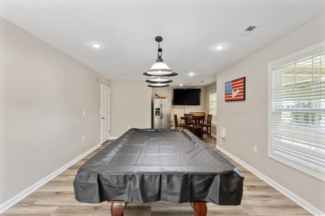 Recreation room featuring billiards, light wood-style flooring, and recessed lighting | Image 17