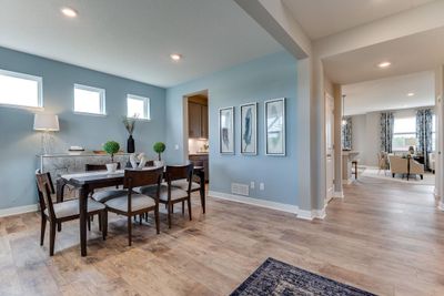 Photos are of the Whitney floorplan and are photos of the decorated model home. | Image 3