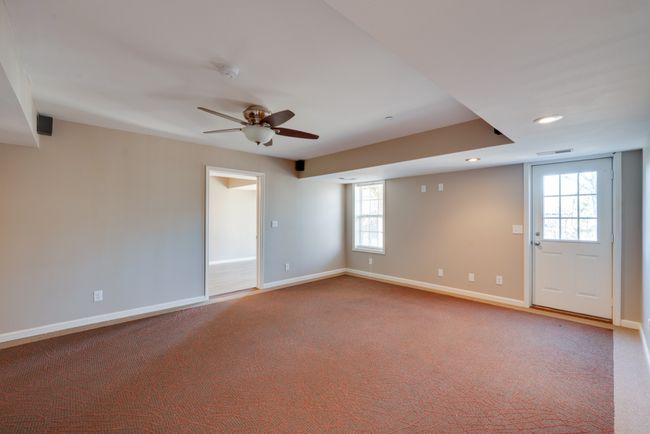 Multi-purpose room in the basement could be used for in-law apartment, teenager apartment, or game room. | Image 34