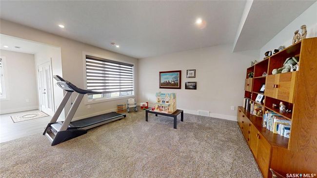 Exercise area with recessed lighting and carpet | Image 28