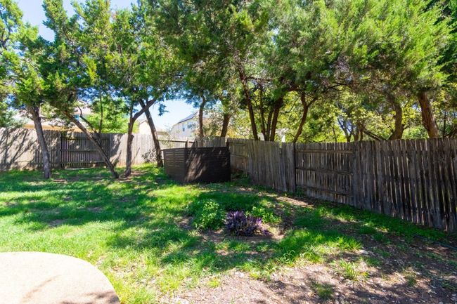 View of yard featuring a fenced backyard | Image 25