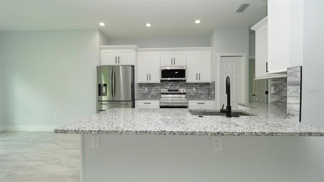12323 Genter Dr, House other with 4 bedrooms, 2 bathrooms and null parking in Spring Hill FL | Image 8
