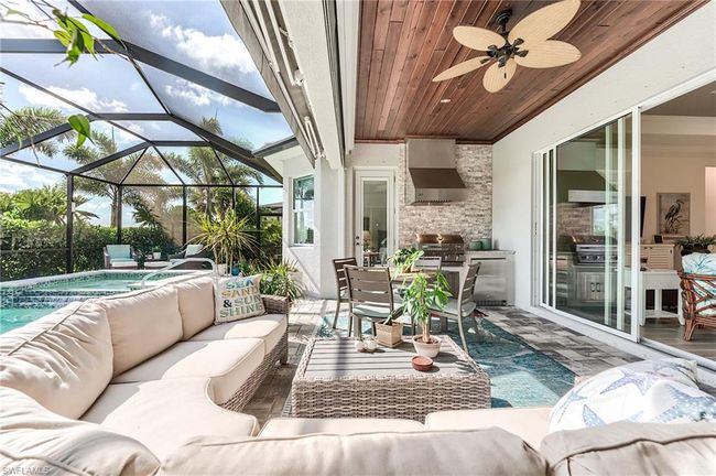 Covered lanai with outdoor grill | Image 40