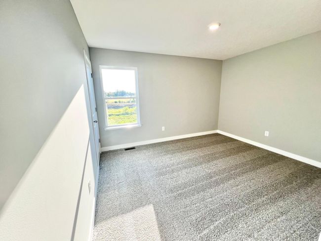 Actual home: Another one of the 4 bedrooms on the upper level, directly adjacent to a 3/4 bath. | Image 35