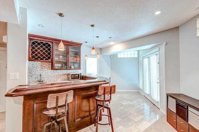94 Mckenzie Lake Island Se, Home with 4 bedrooms, 4 bathrooms and 7 parking in Calgary AB | Image 34
