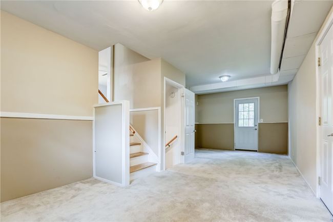 lower family room off the garage | Image 9