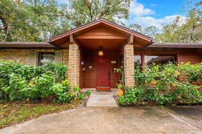 Not commonly found these days is a cozy FRONT PORCH, ready to decorate for the holidays and perfect for sipping your morning coffee and embracing the beautiful sounds of nature. | Image 2