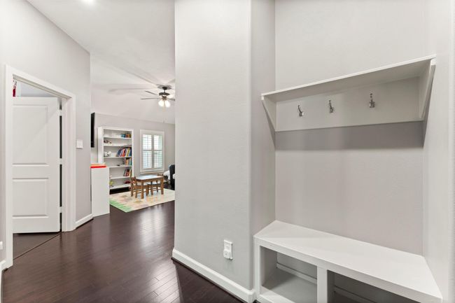 Mud area off the garage and large laundry room. | Image 17