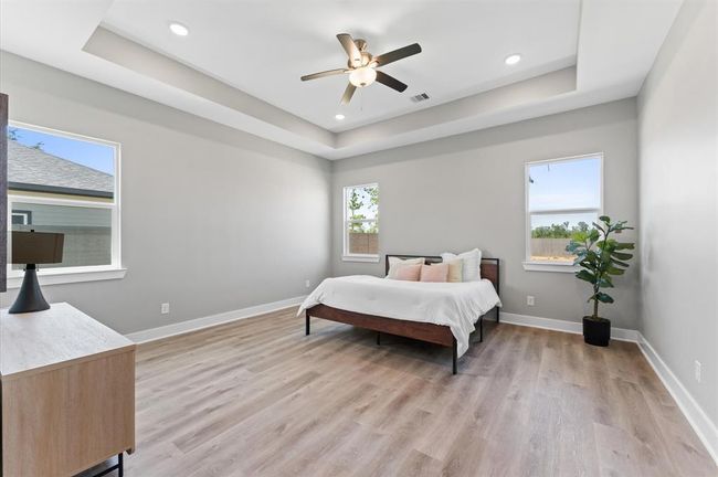 Oversized primary suite with room for a sitting area and tons of natural light. | Image 17
