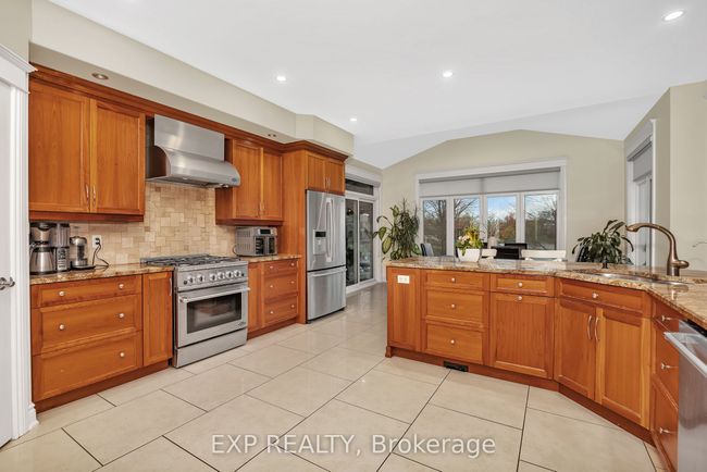 6703 Suncrest Dr, House other with 6 bedrooms, 5 bathrooms and 8 parking in Greely ON | Image 7