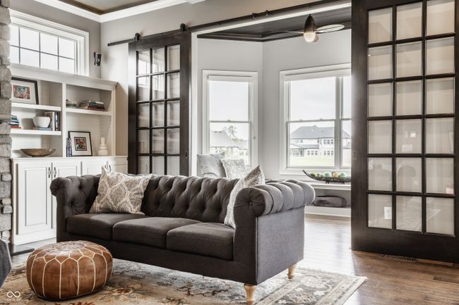 Looking into sunroom from living room | Image 16