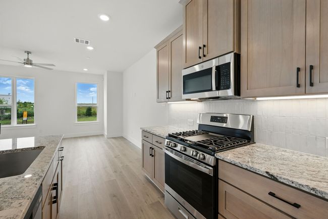 Classic finishes, beautiful cabinetry and fantastic space...any chef would be proud to call this kitchen their own! | Image 10
