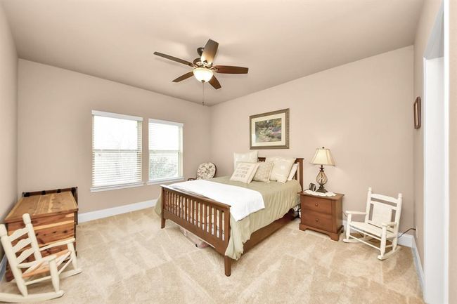Upstairs and down its own separate hallway, enter Bedroom #2 | Image 26
