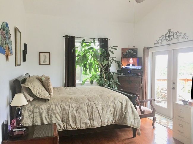 Master bedroom with balcony access with large office area and full bathroom plus walk in closet | Image 14