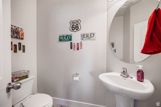 Half bath with toilet and a sink | Image 12