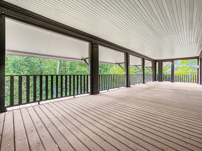 The gallery and dining room open onto a sprawling | Image 17