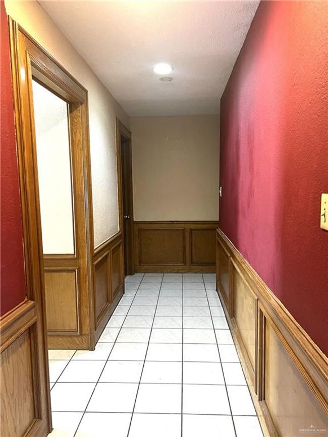 Hallway featuring light tile patterned floors | Image 5