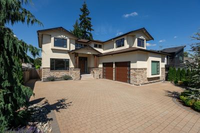 1049 Grover Ave, House other with 8 bedrooms, 6 bathrooms and 6 parking in Coquitlam BC | Image 1