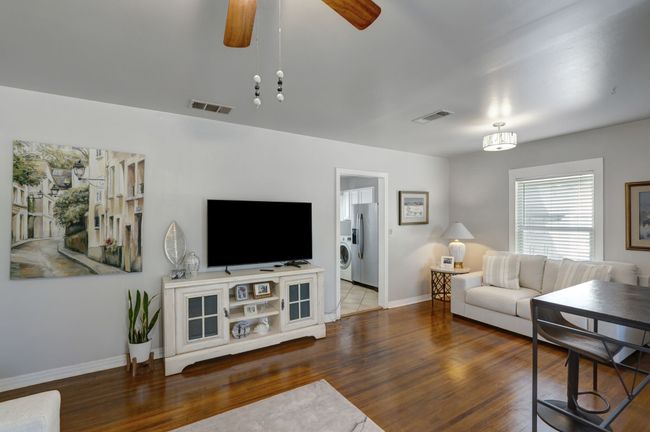 Living room featuring dark hardwood / floors | Image 5